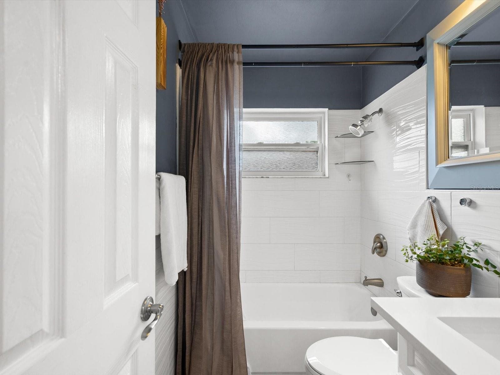 hallway bathroom - 2375 81ST ST N, ST PETERSBURG