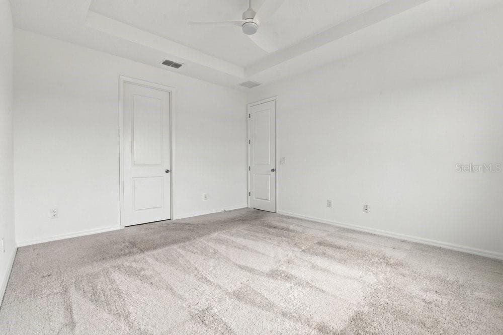 Owners' Suite with tray ceiling - 2378 GOLD DUST DR, MINNEOLA