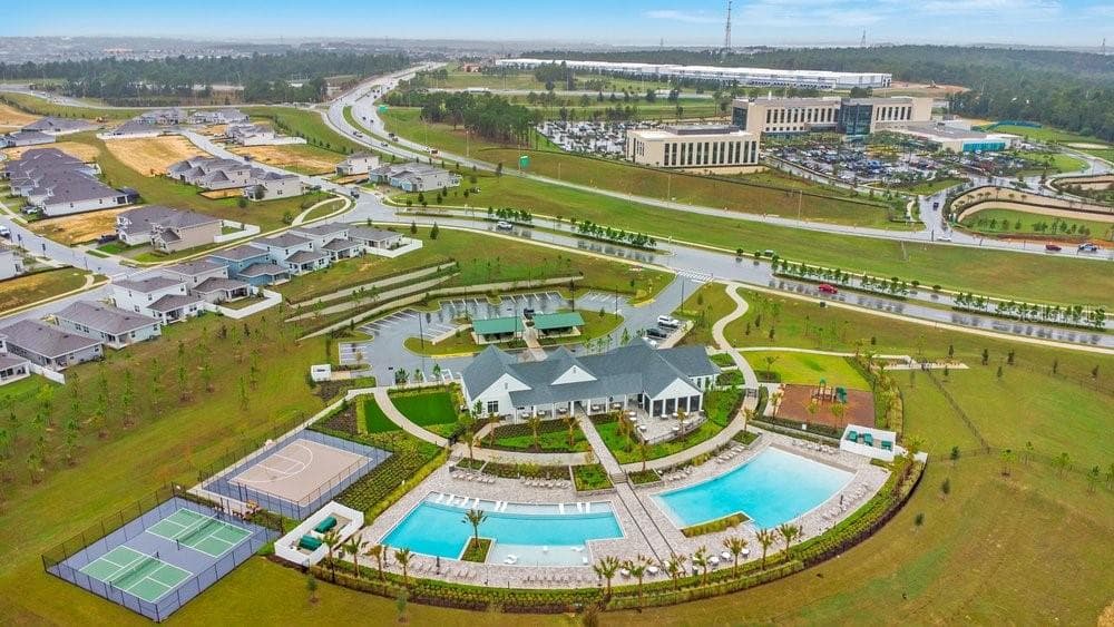 Amenities Center with AdventHealth Hospital in the distance - 2378 GOLD DUST DR, MINNEOLA