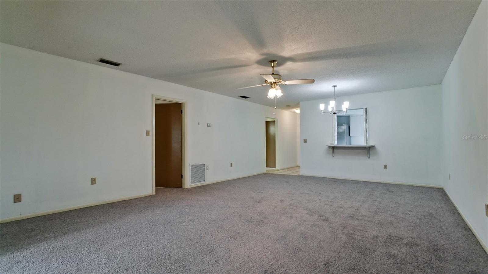 Primary bedroom door is 1st on the left, then the guest room door further down - 7110 11TH AVE W, BRADENTON