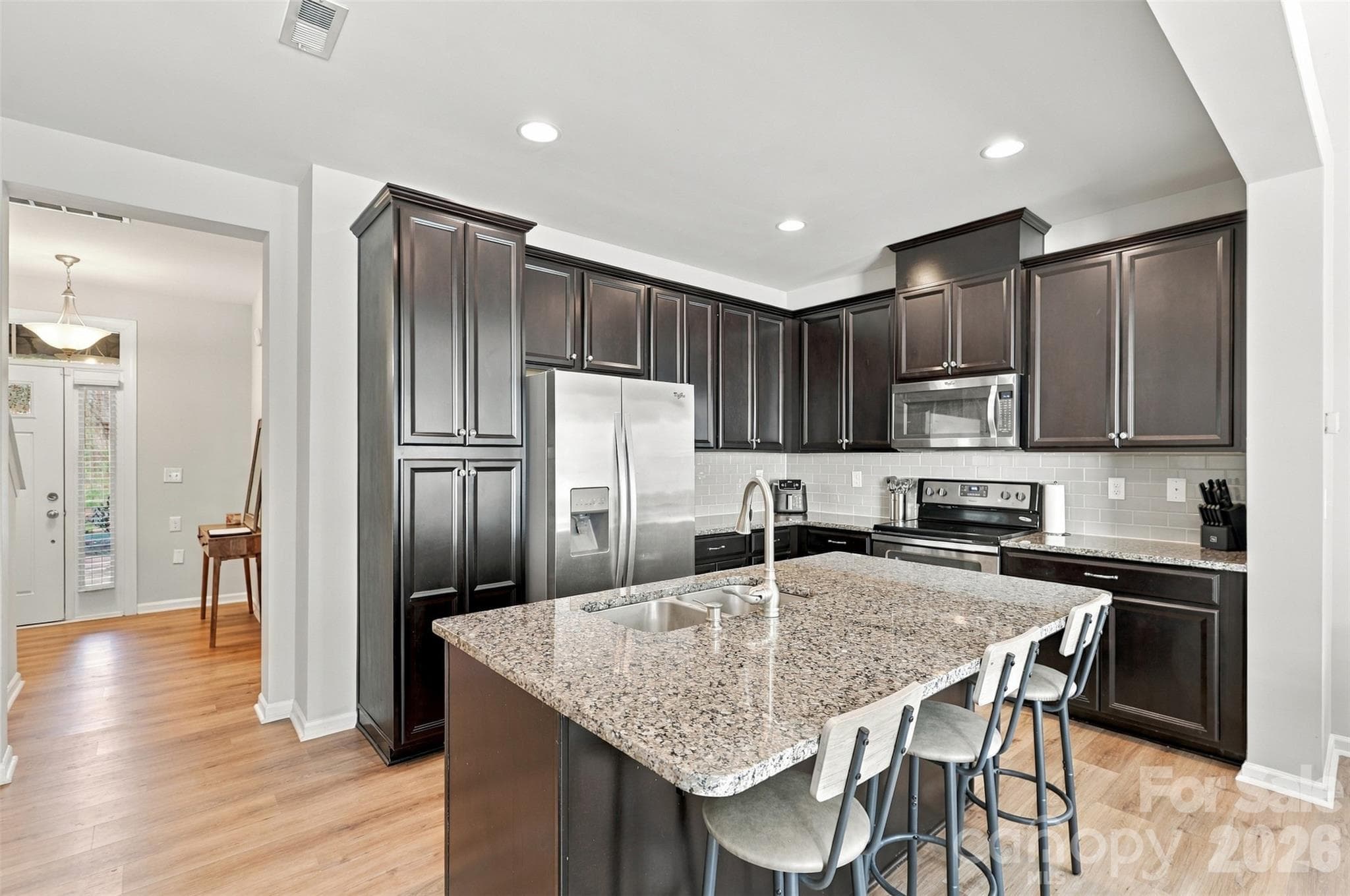 Kitchen- spacious island, granite countertops - 1020 Archibald Avenue, Fort Mill