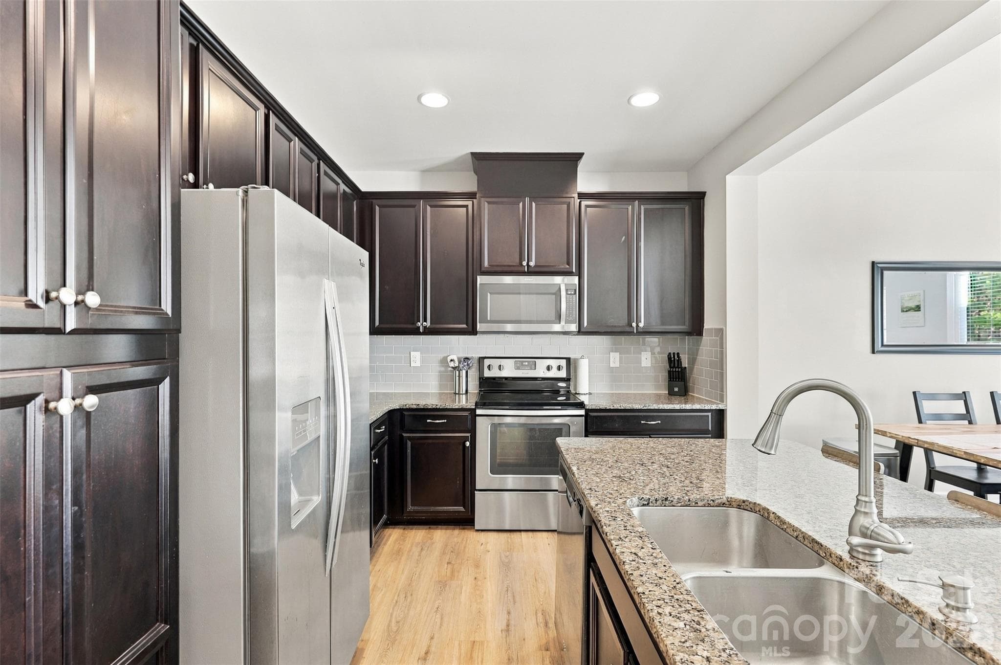 Kitchen- spacious island, granite countertops - 1020 Archibald Avenue, Fort Mill