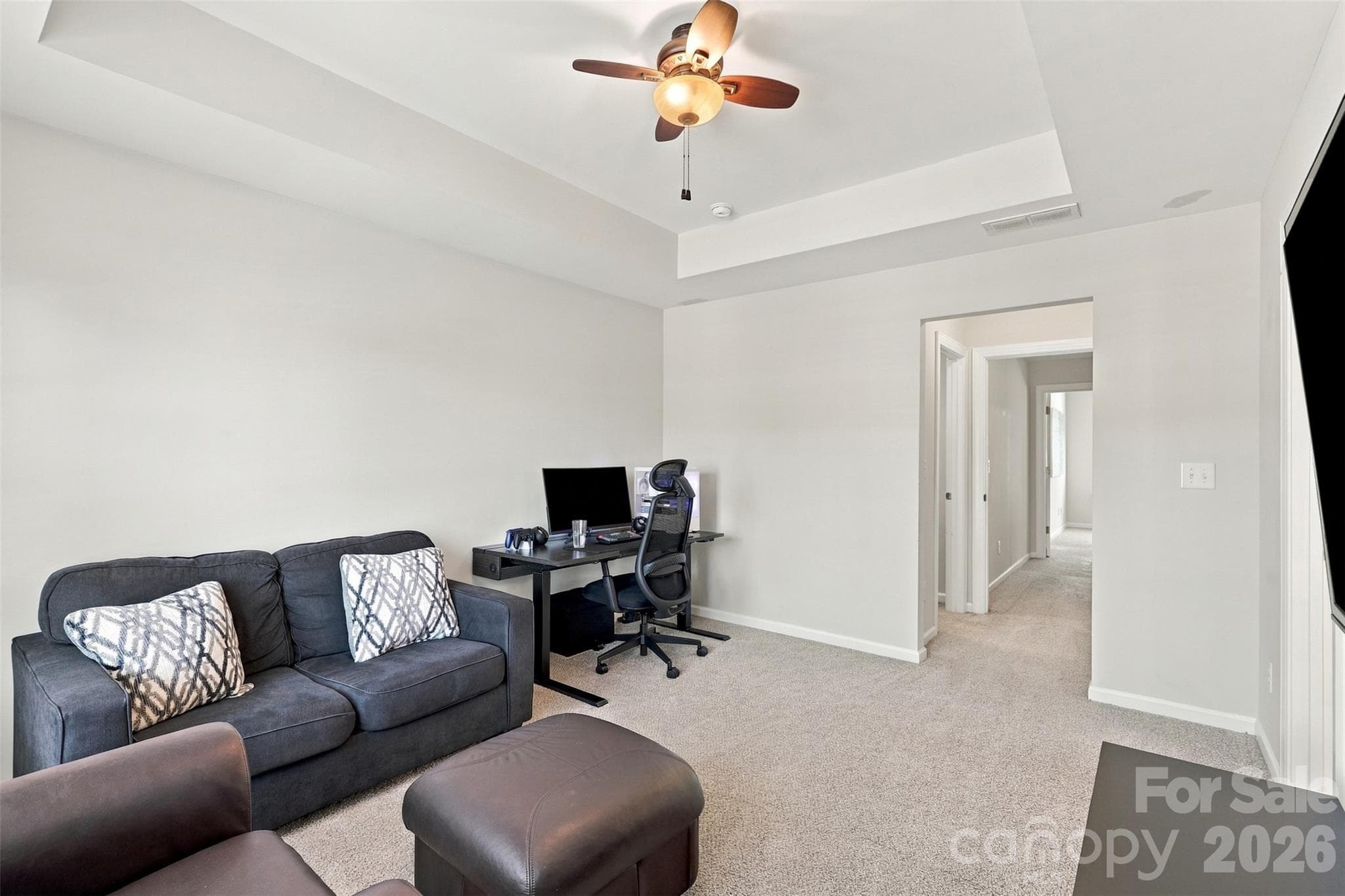 Bedroom 1- tray ceiling, ensuite bath with tiled floors, dual vanity, & tub/shower combo! - 1020 Archibald Avenue, Fort Mill
