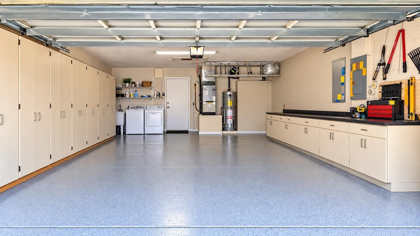 Organized Garage spaces (virtually staged to remove boxes currently staged in home) - 6803 LONGPOINTE WAY, TAMPA