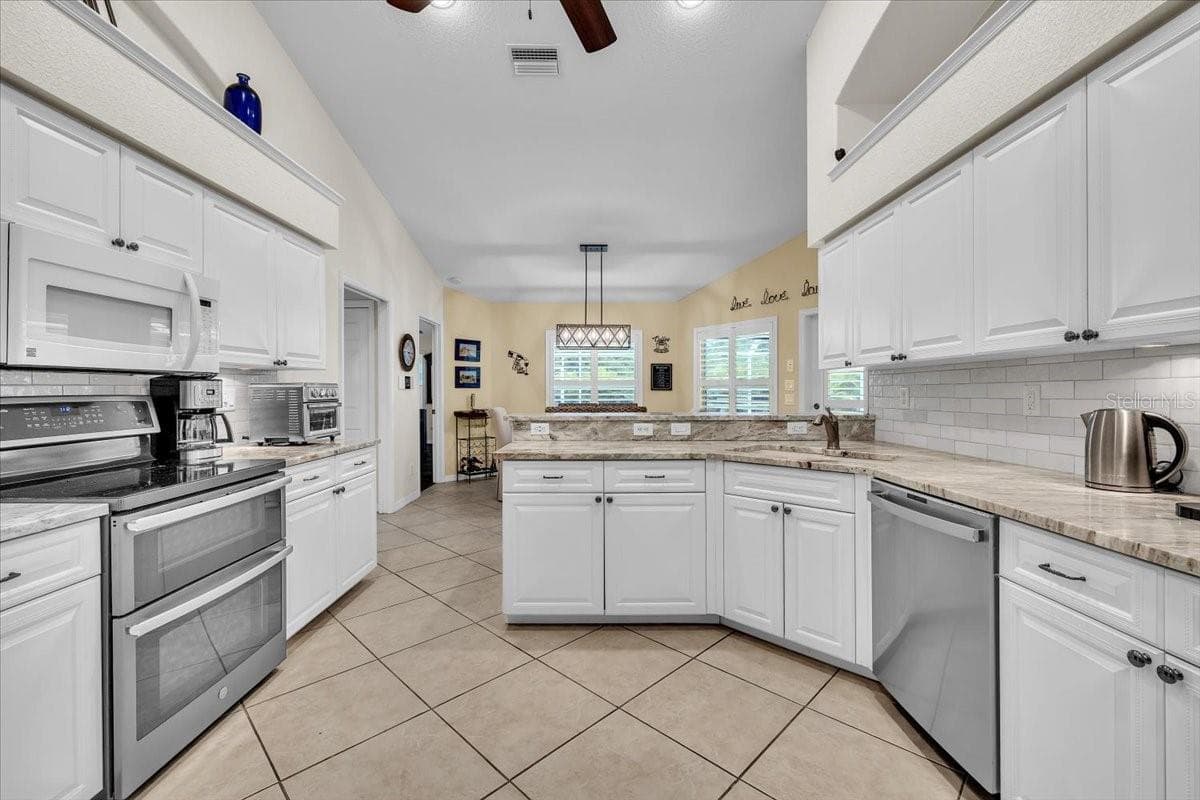 Single Family Residence at 12 TOURNAMENT RD, ROTONDA WEST, photo 25 of 86