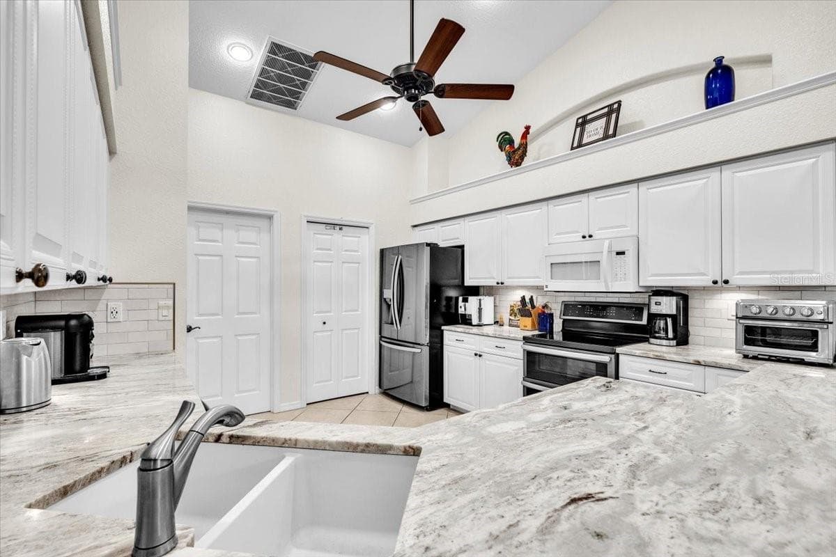 Single Family Residence at 12 TOURNAMENT RD, ROTONDA WEST, photo 32 of 86