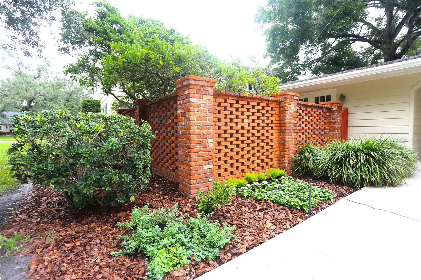 Brick Wall Surrounding the Private Courtyard - 4414 W WATROUS AVE, TAMPA