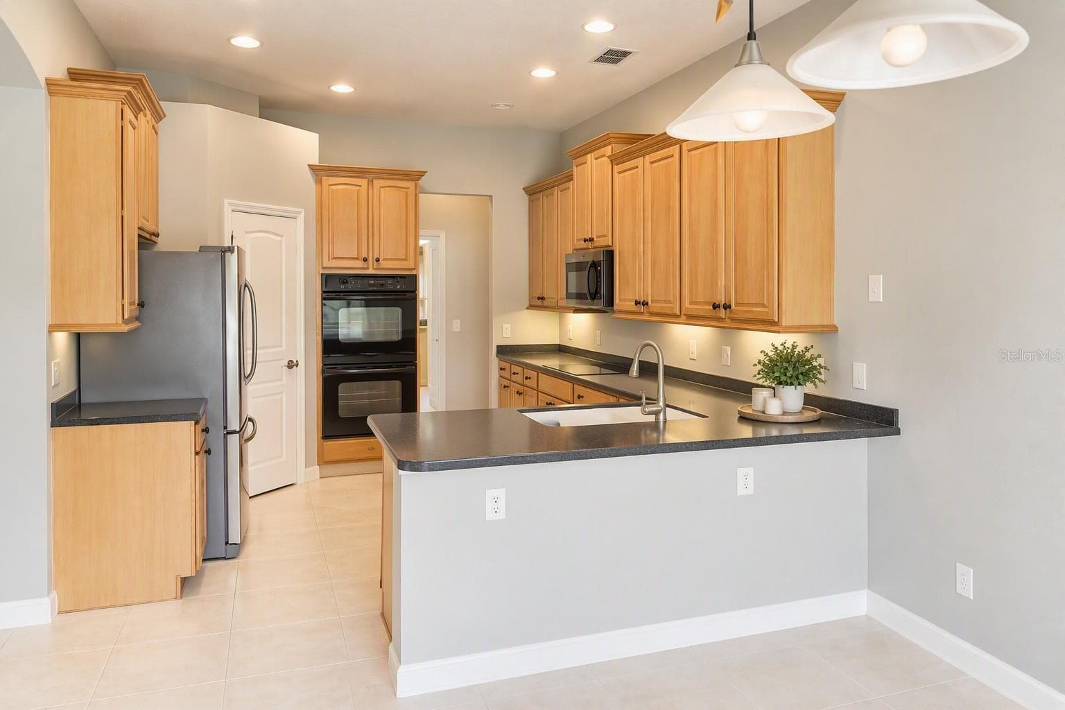 Actual Kitchen with double oven - 4048 GREYSTONE DR, CLERMONT
