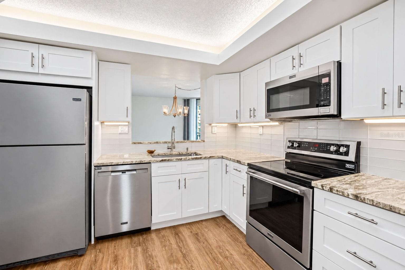 Beautiful kitchen remodel. Shaker cabinets, soft close drawers, newer stainless appliance package - 690 ISLAND WAY #606, CLEARWATER