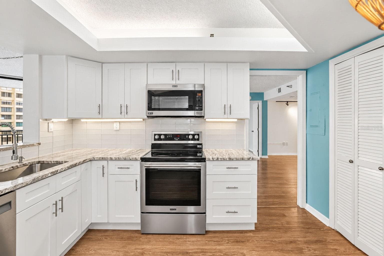Fully remodeled kitchen, Shaker soft close cabinets and premium Maytag stainless appliances - 690 ISLAND WAY #606, CLEARWATER