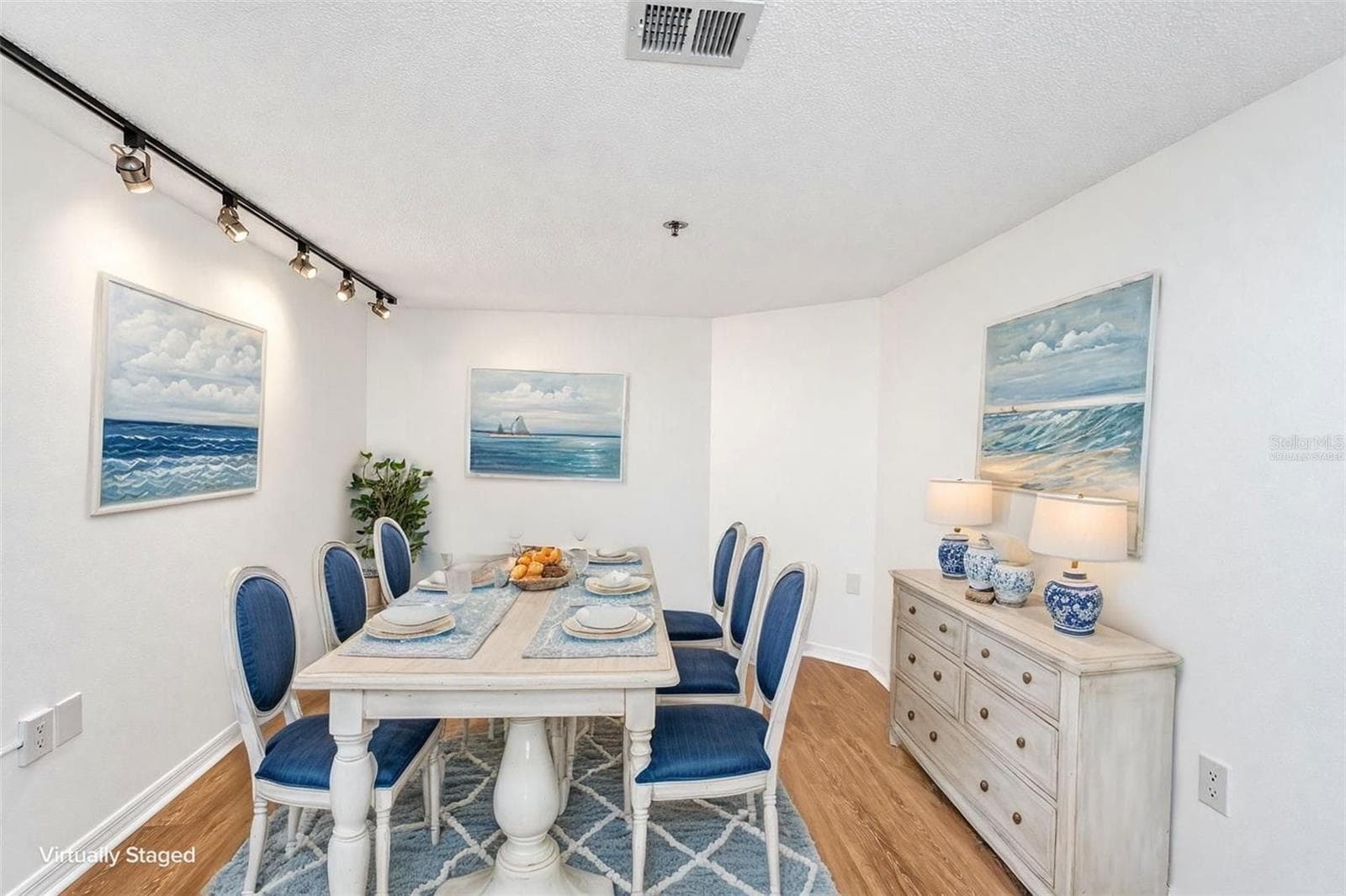 Option 2 for den = dining room furniture virtually staged - 690 ISLAND WAY #606, CLEARWATER