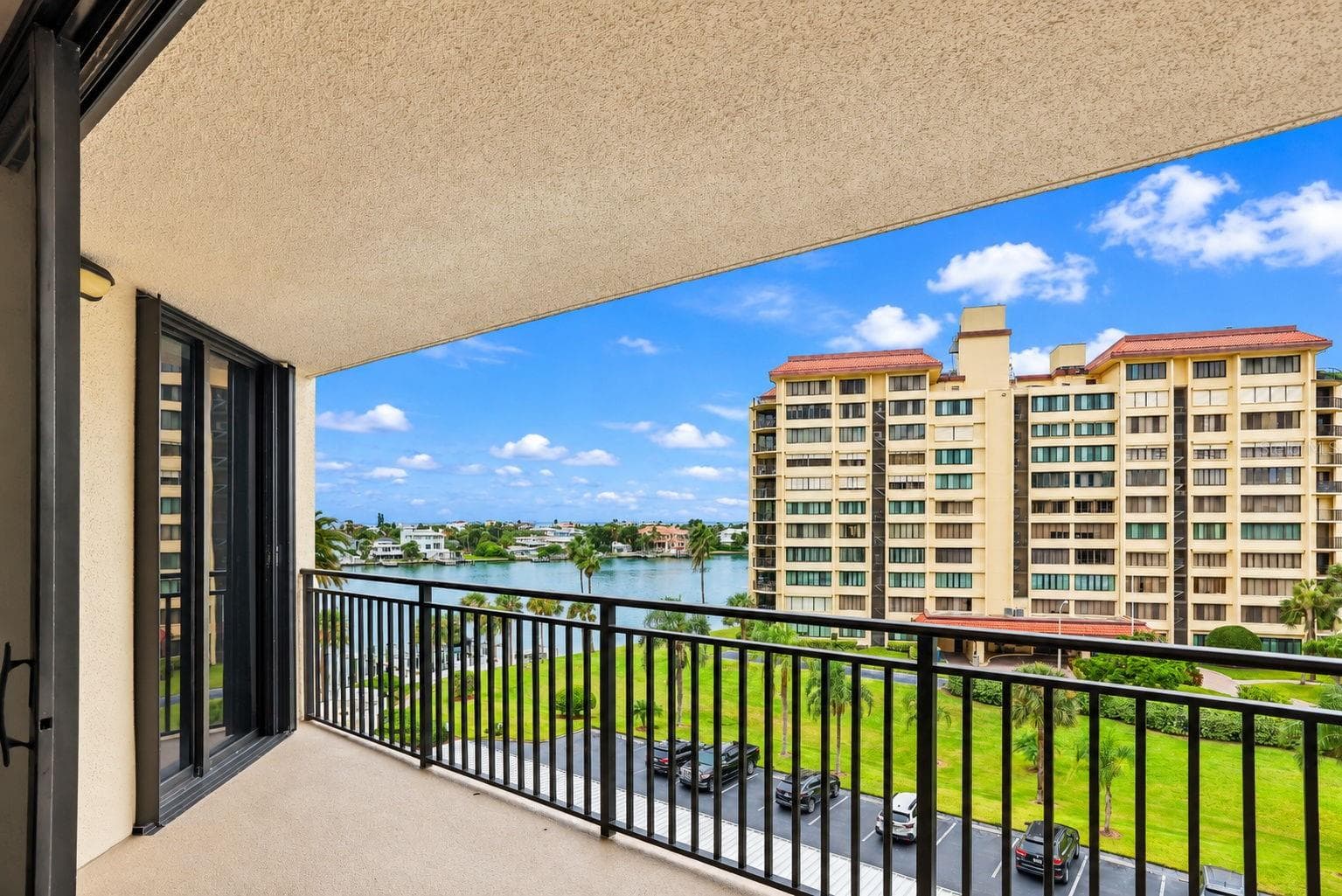 Large Patio undercover. New railings and non-skid flooring. I've seen dolphins from here. Facing West. - 690 ISLAND WAY #606, CLEARWATER
