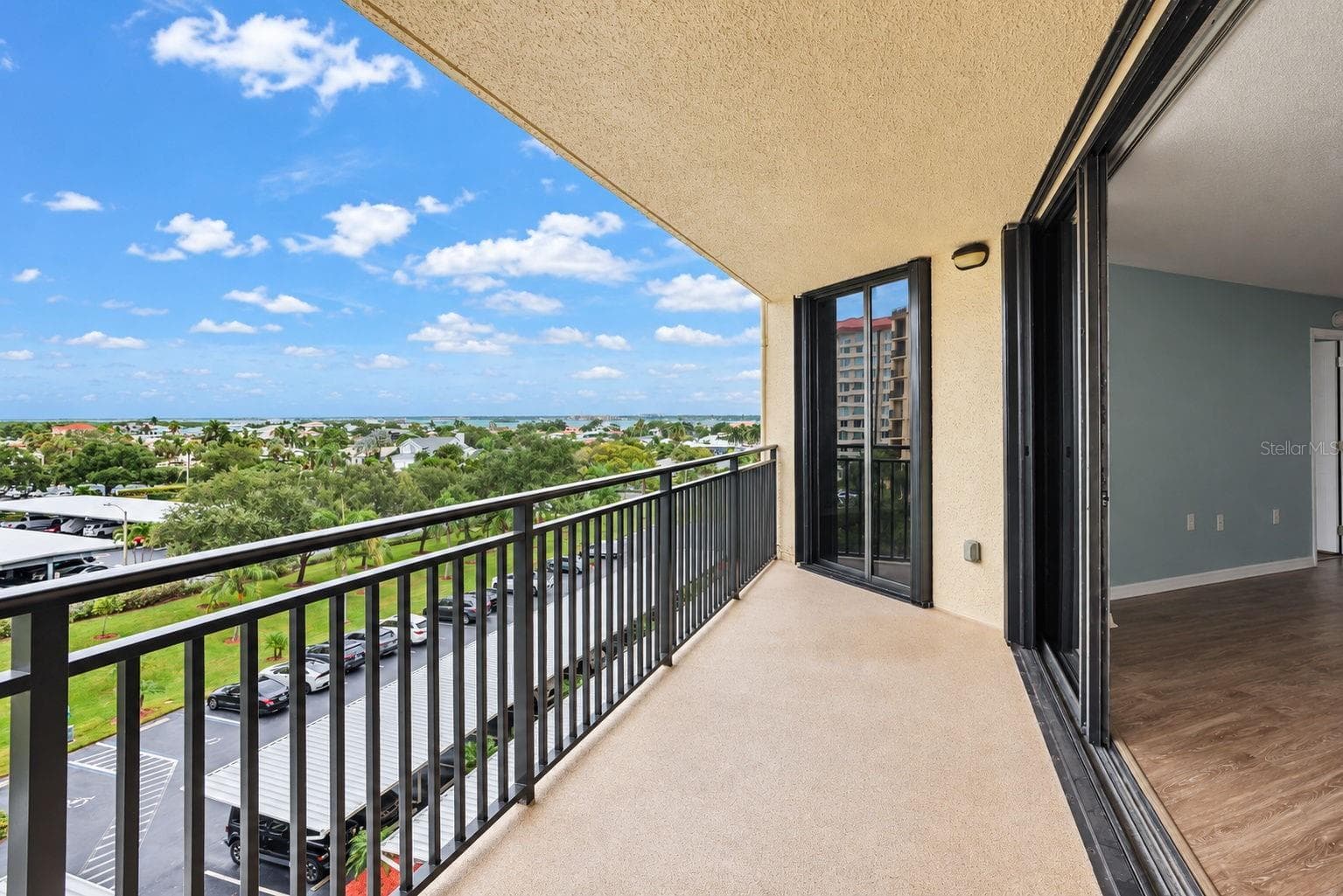 Large Patio undercover. New railings and non-skid flooring. Facing East - 690 ISLAND WAY #606, CLEARWATER