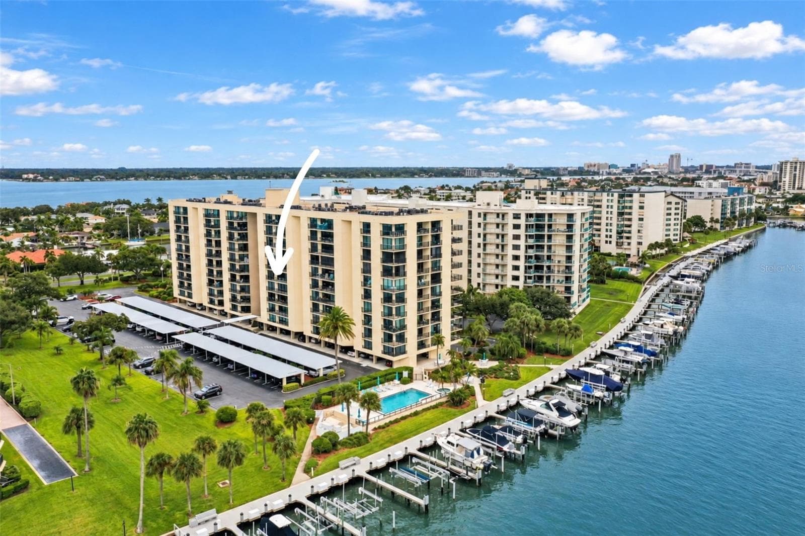 Overhead drone shot of this spectacular Clearwater, FL location. showing marina. Come and see for yourself! - 690 ISLAND WAY #606, CLEARWATER
