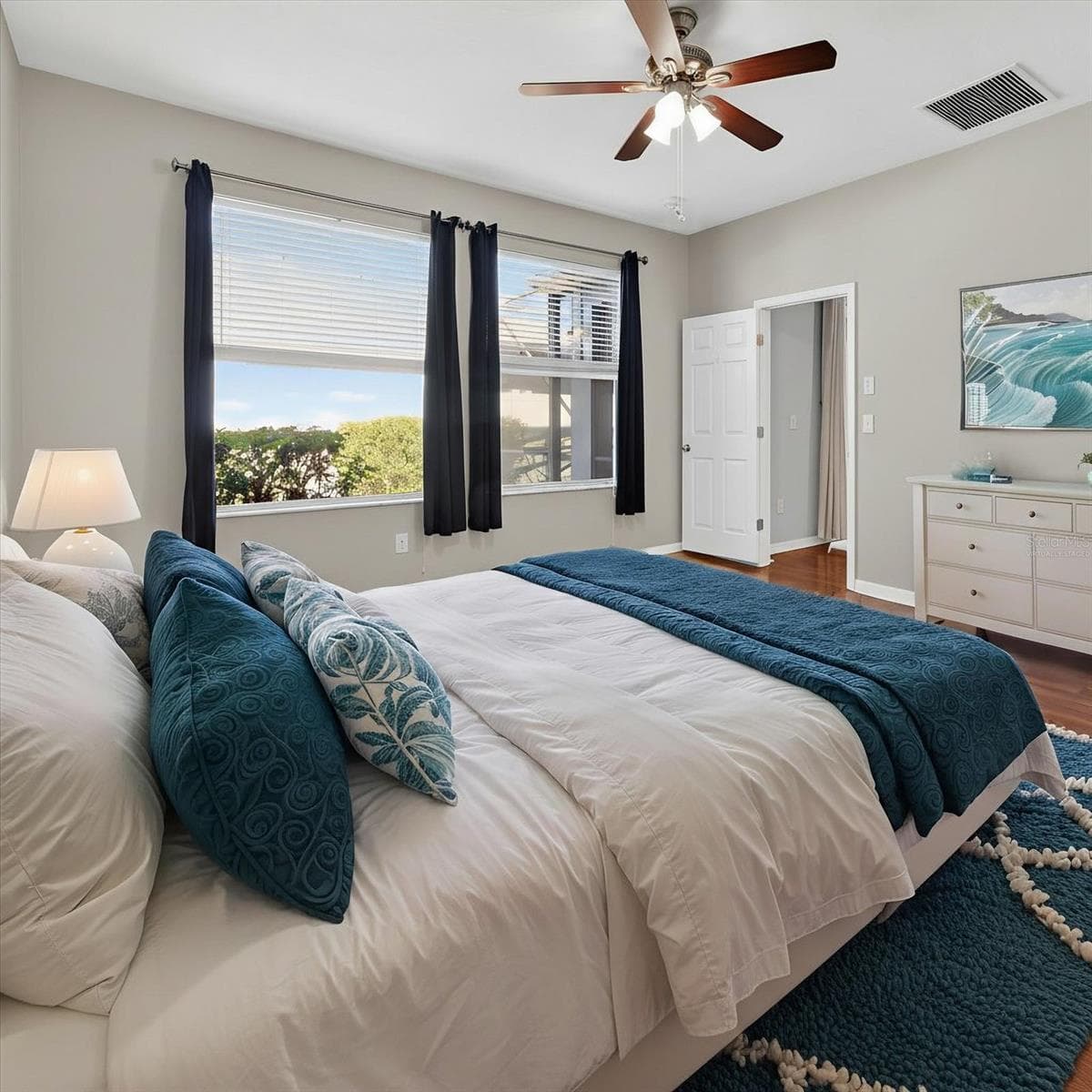 Virtually staged bedroom to illustrate potential furniture placement. - 2153 BARRACUDA CT, HOLIDAY