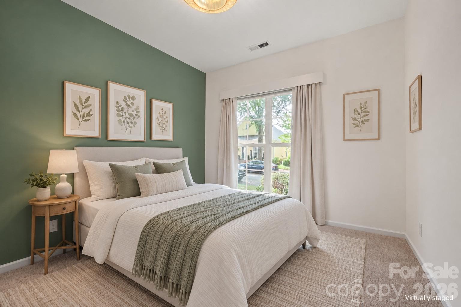 Virtually Staged bedroom 2, showing a full sized bed - 14525 Holly Springs Drive, Huntersville
