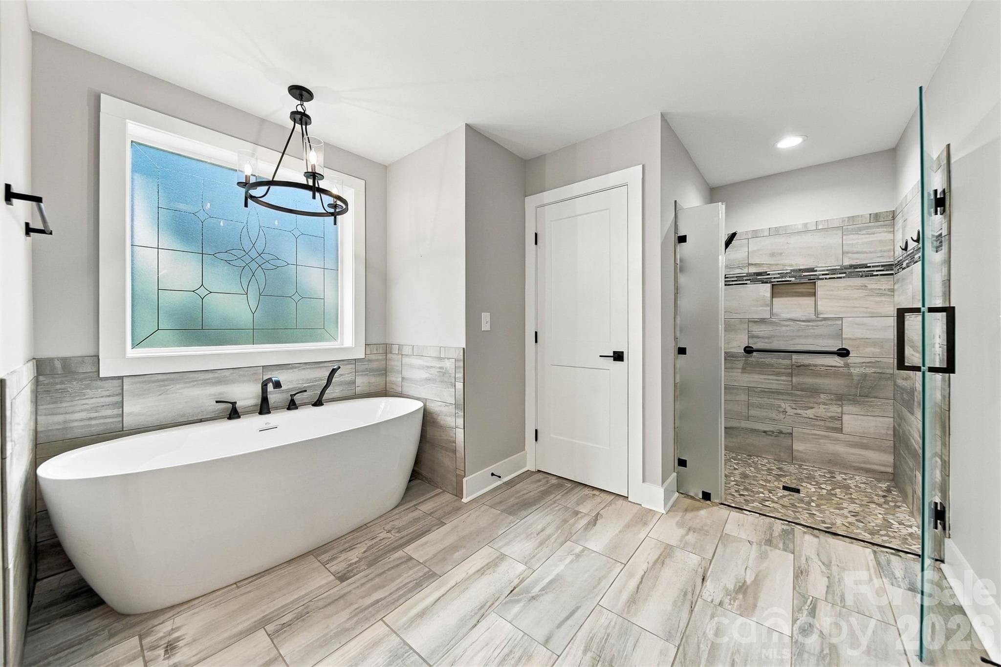 Primary Ensuite- Zero entry shower, water closet, spa like tub - 41 Emerson Court, Taylorsville