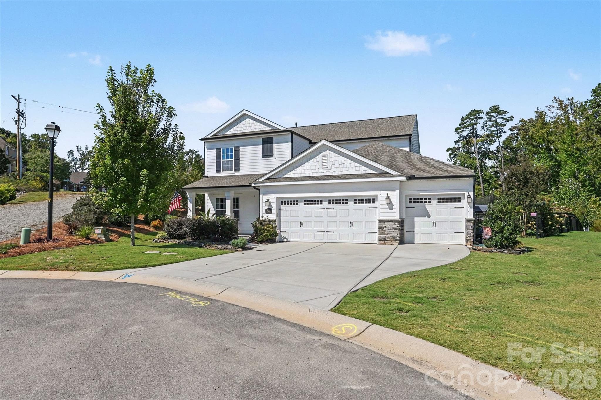 Beautiful curb appeal, thoughtful landscaping, and a spacious driveway. - 2703 Wedgewood Court, Denver