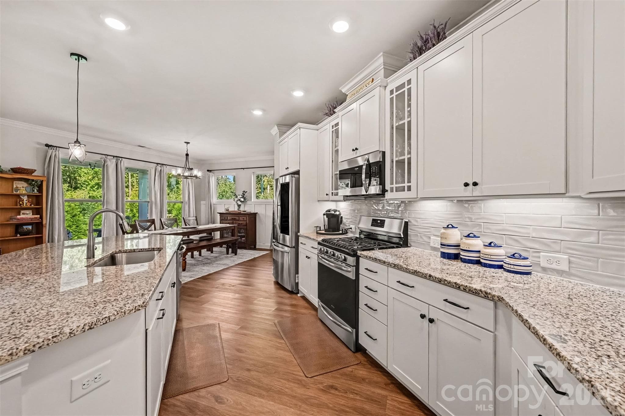 White cabinetry, generous counter space, and a layout designed for everyday living. - 2703 Wedgewood Court, Denver