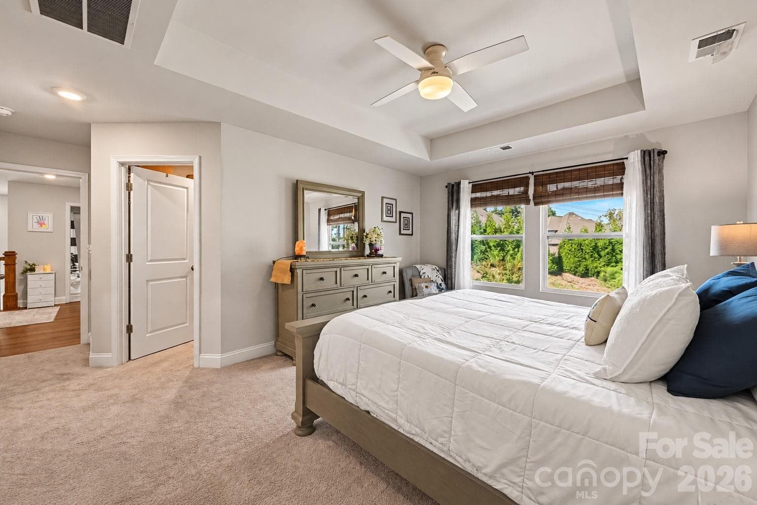 Step straight from the primary bedroom into the en suite bath. - 2703 Wedgewood Court, Denver