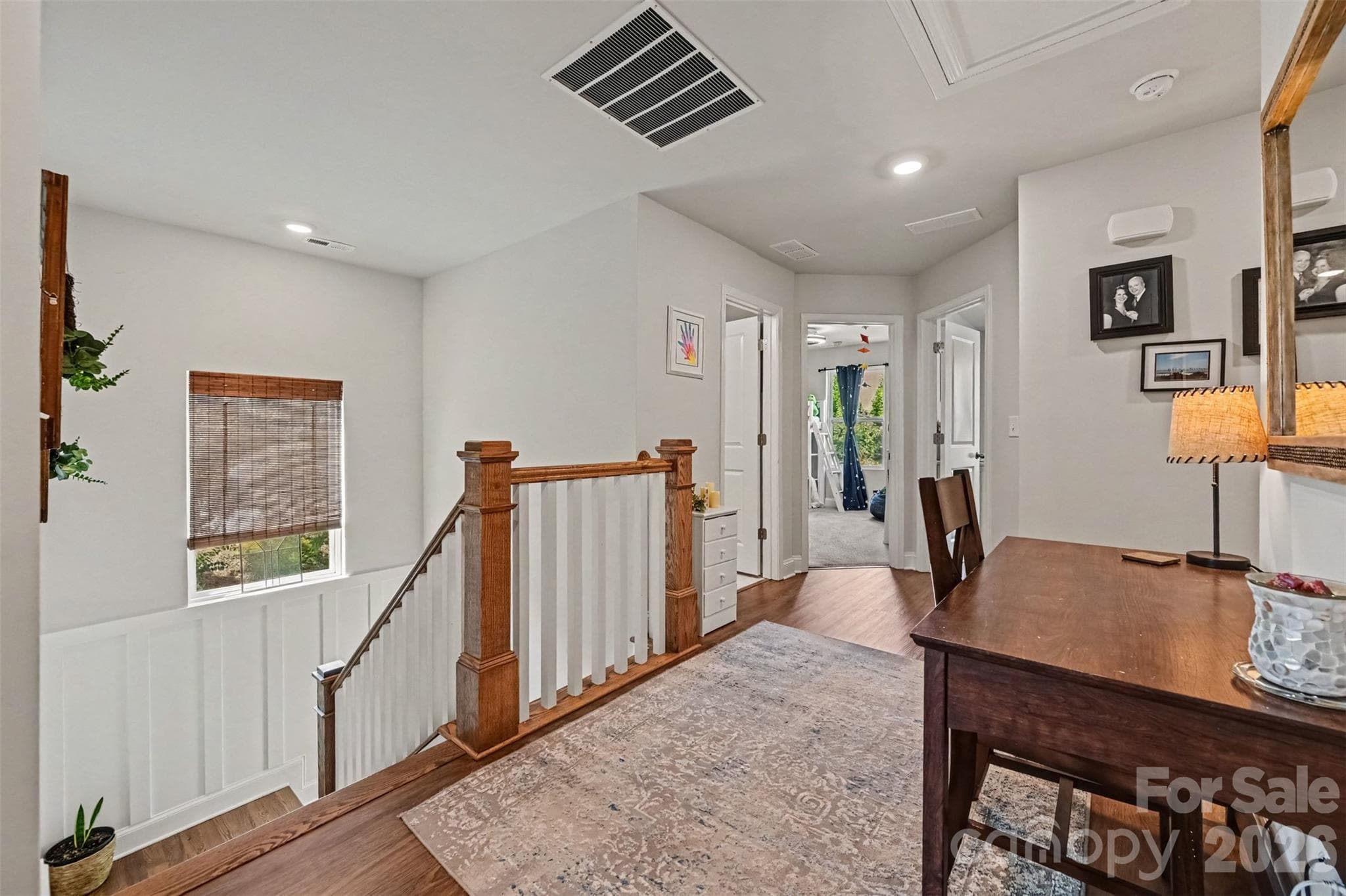 The upstairs loft is ideal for a workstation or reading nook. - 2703 Wedgewood Court, Denver