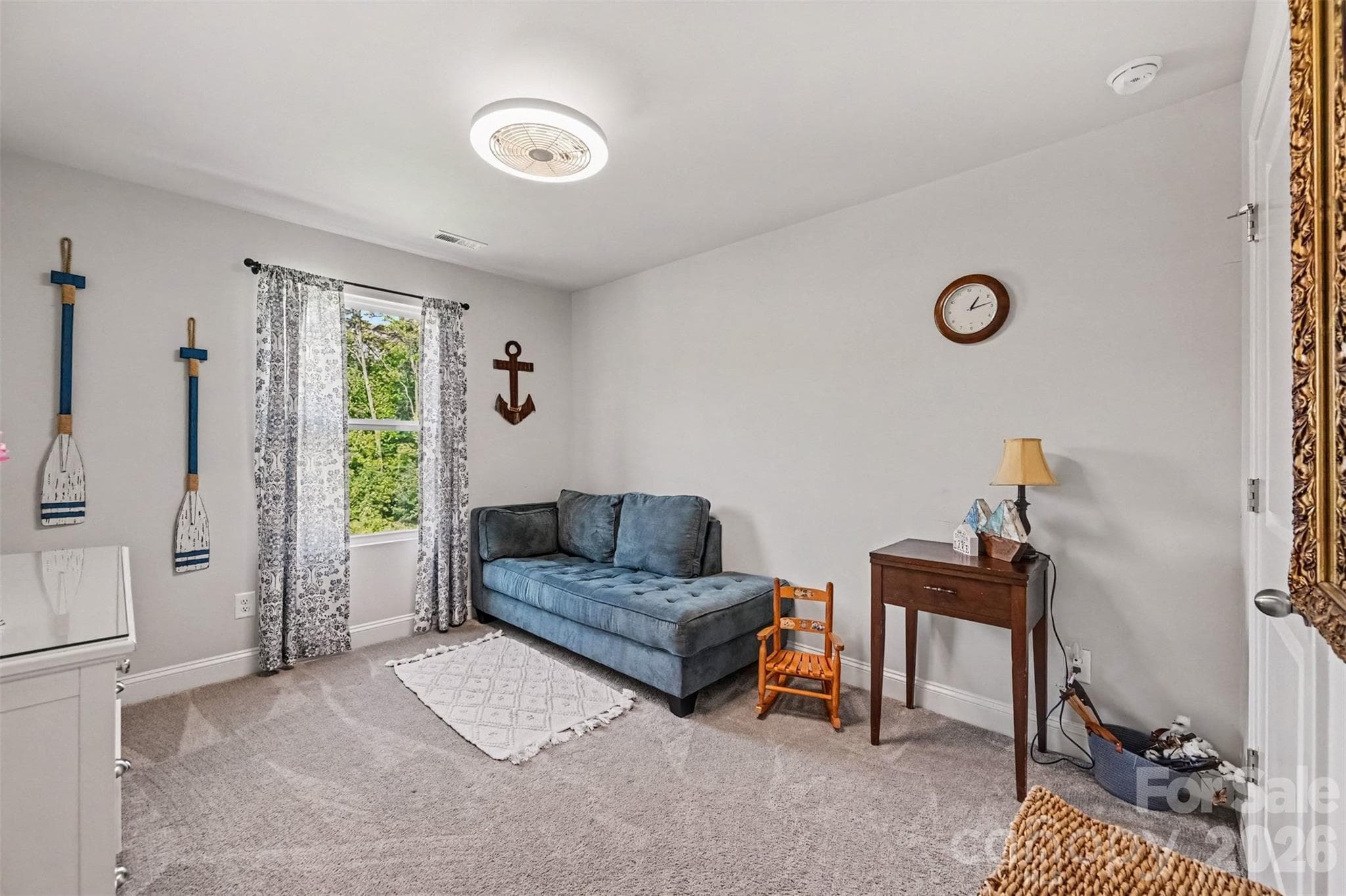 A bonus room ready to be a media room, gym, or guest hangout. - 2703 Wedgewood Court, Denver