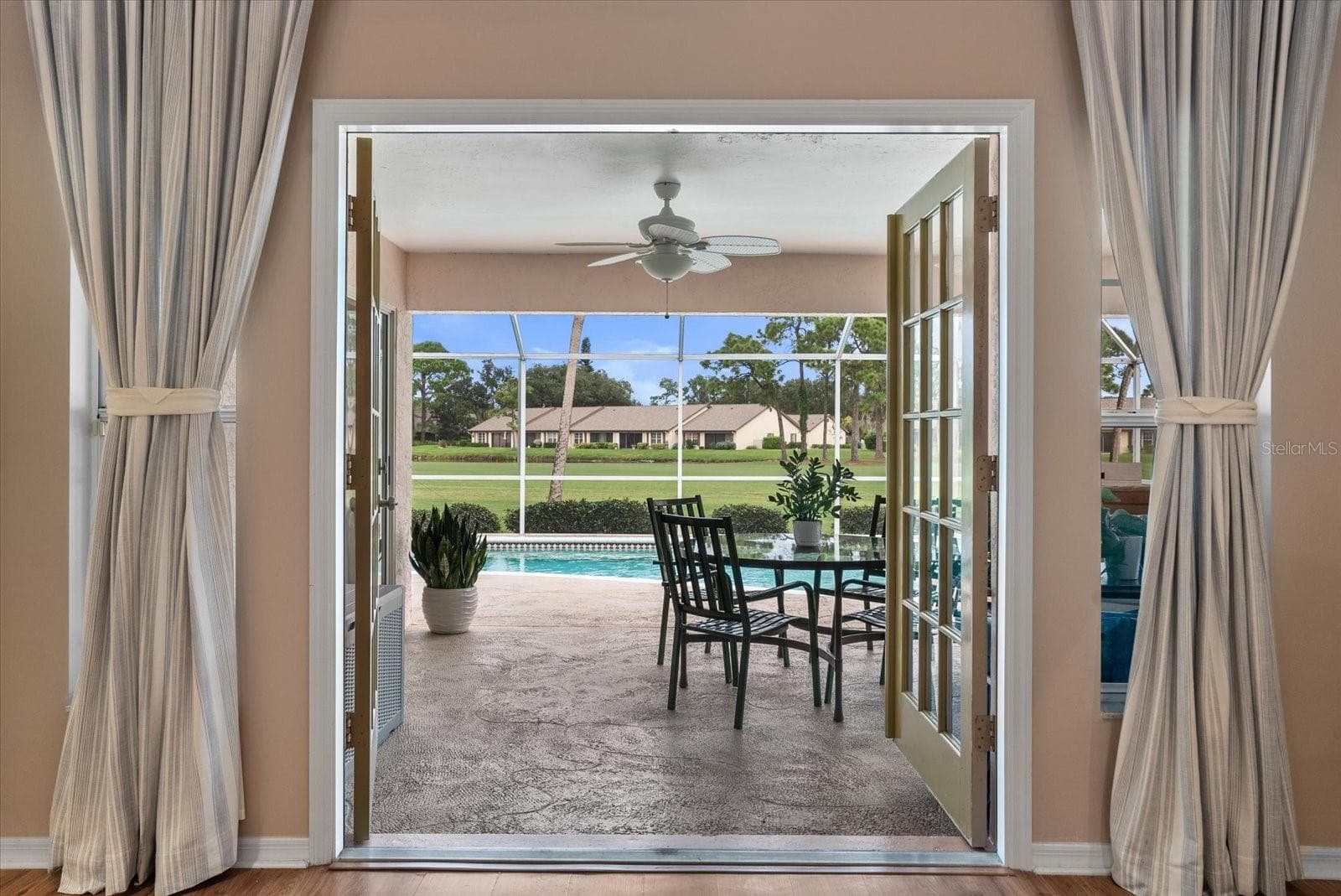 French Doors to Pool Area - 5815 FAIRWOODS CIR, SARASOTA