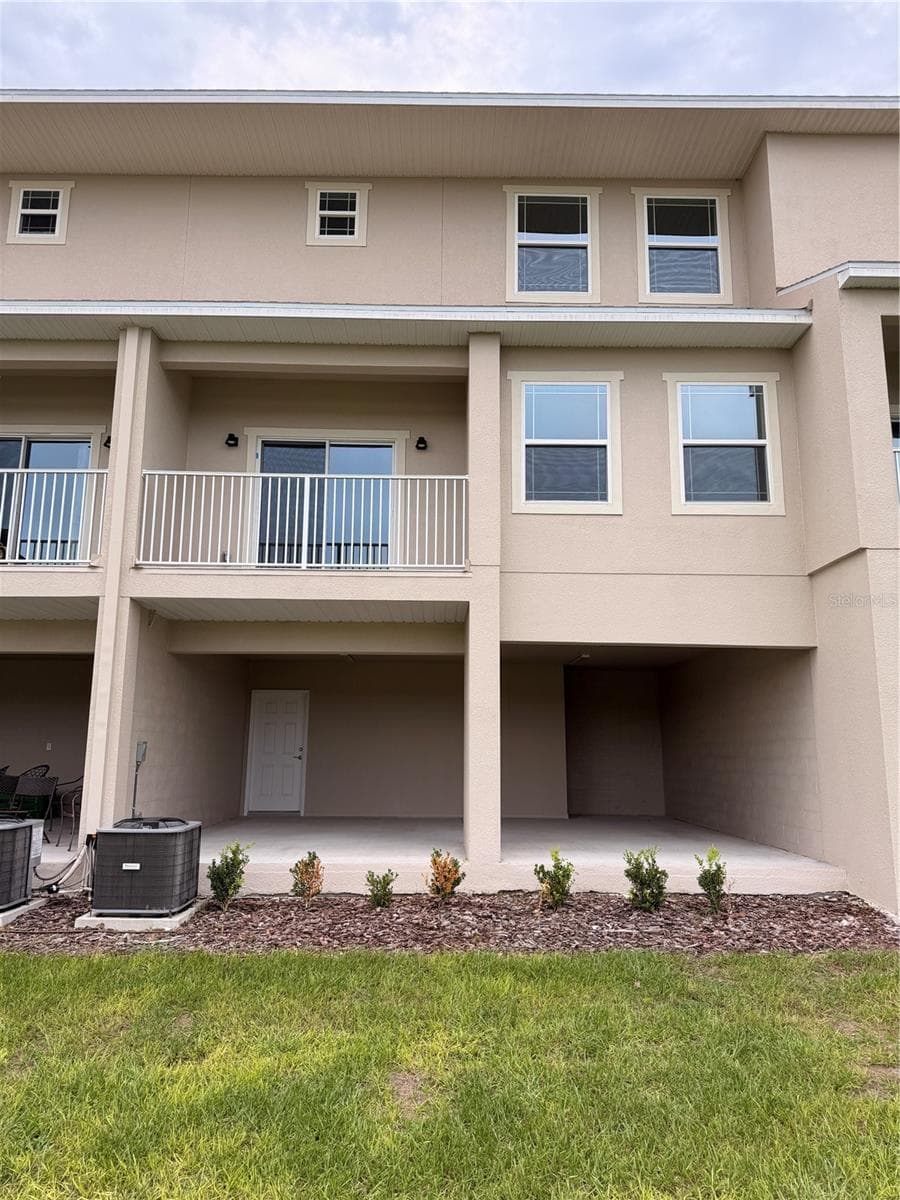 Back/ basement - 915 LAKEFRONT VILLAGE DR, CLERMONT