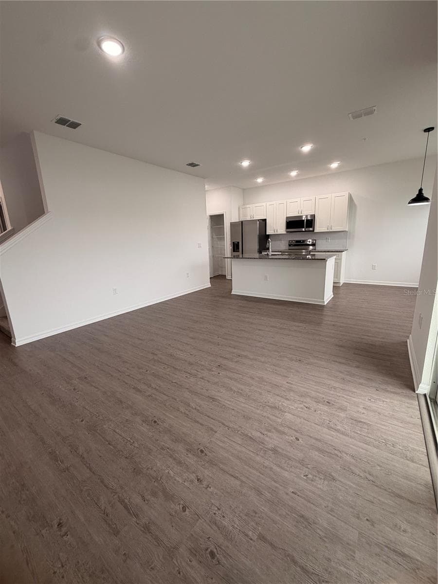 living area - 915 LAKEFRONT VILLAGE DR, CLERMONT