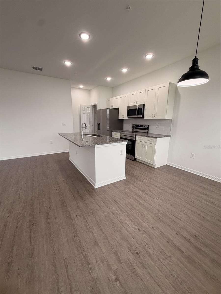 dinning area/breakfast nook - 915 LAKEFRONT VILLAGE DR, CLERMONT