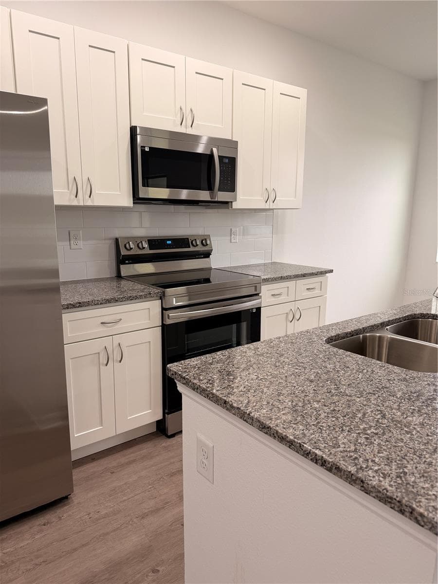 brand new appliances - 915 LAKEFRONT VILLAGE DR, CLERMONT