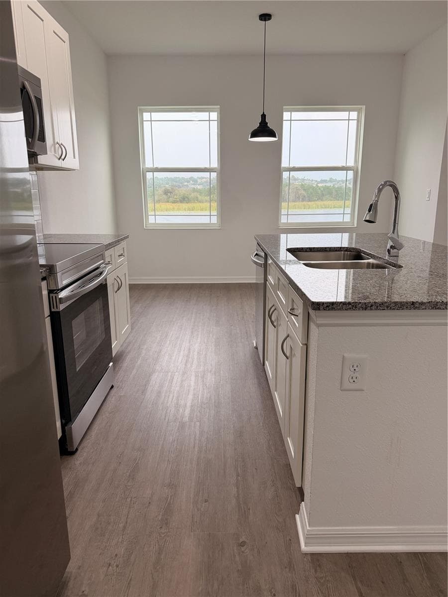 Townhouse at 915 LAKEFRONT VILLAGE DR, CLERMONT, photo 19 of 49