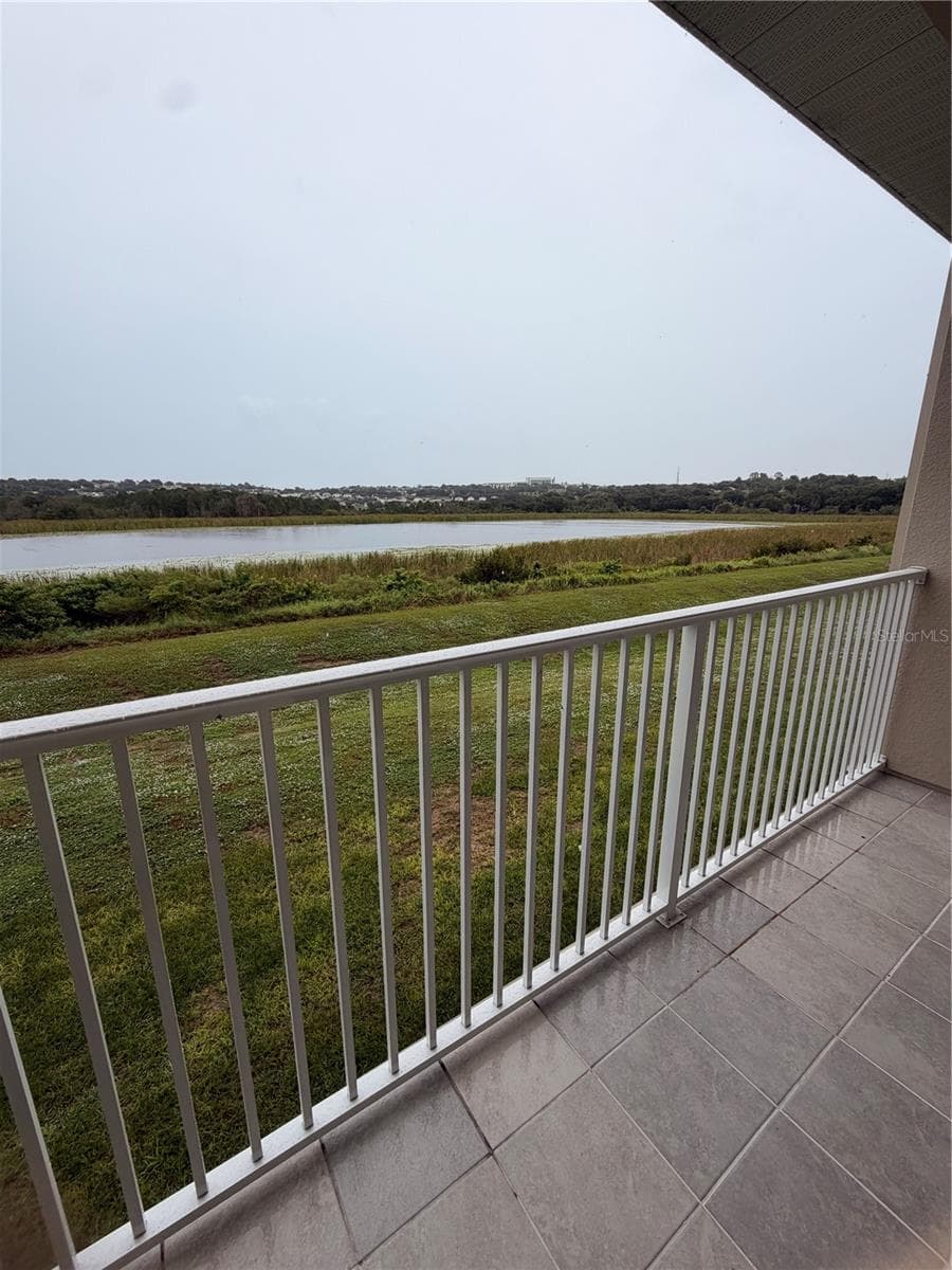 Right side Lake view from balcony - 915 LAKEFRONT VILLAGE DR, CLERMONT