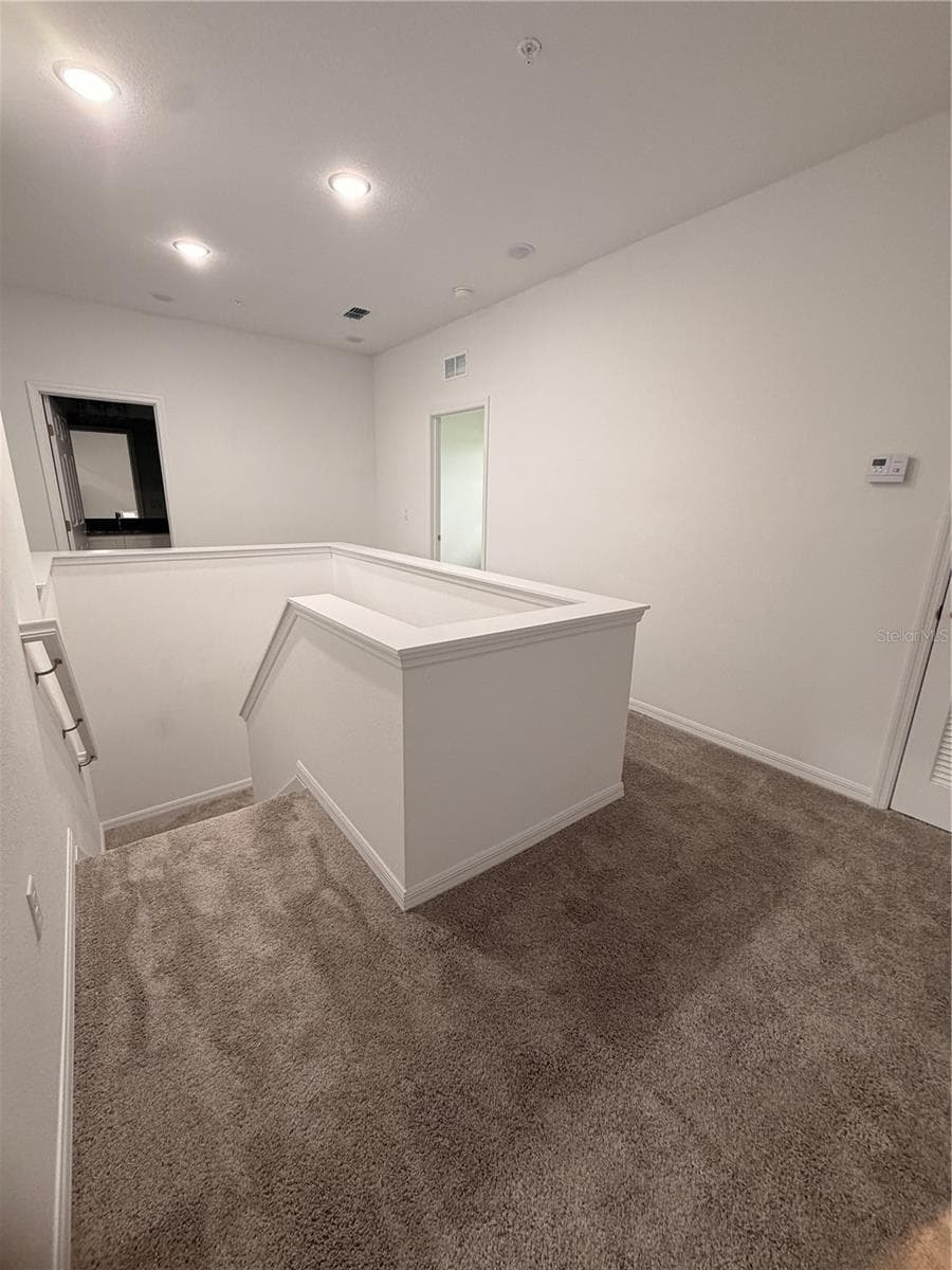 Second floor halls - 915 LAKEFRONT VILLAGE DR, CLERMONT