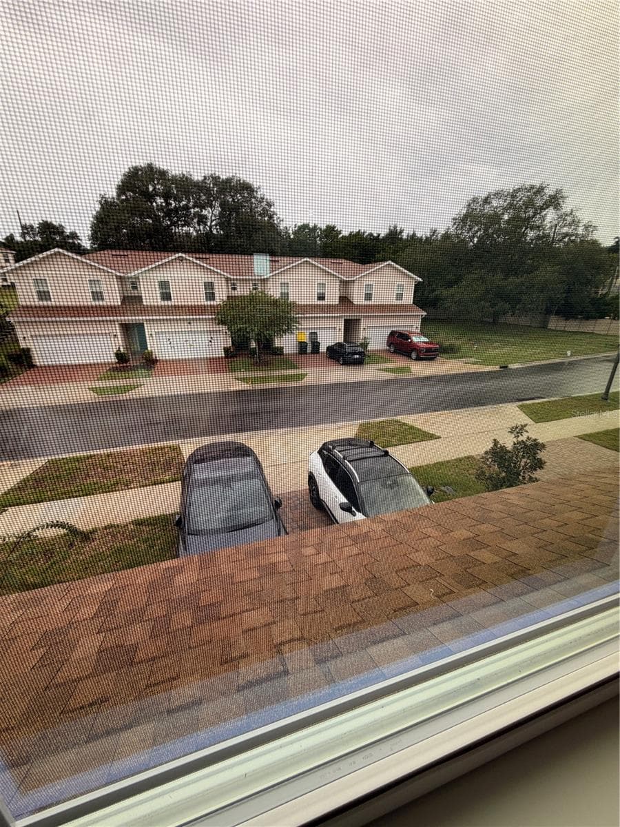 view from 2nd and 3rd bedrooms - 915 LAKEFRONT VILLAGE DR, CLERMONT