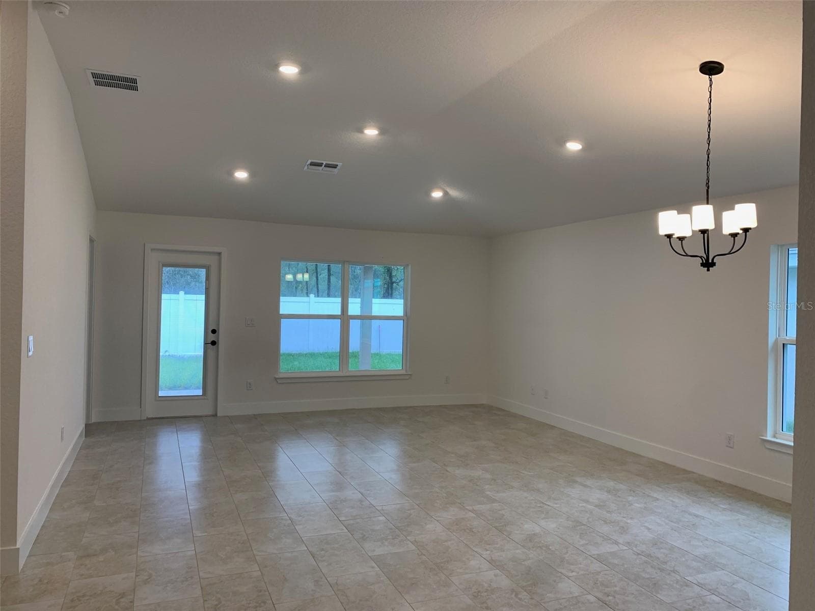 Great room/dining - 11611 GRACE RD, WEEKI WACHEE