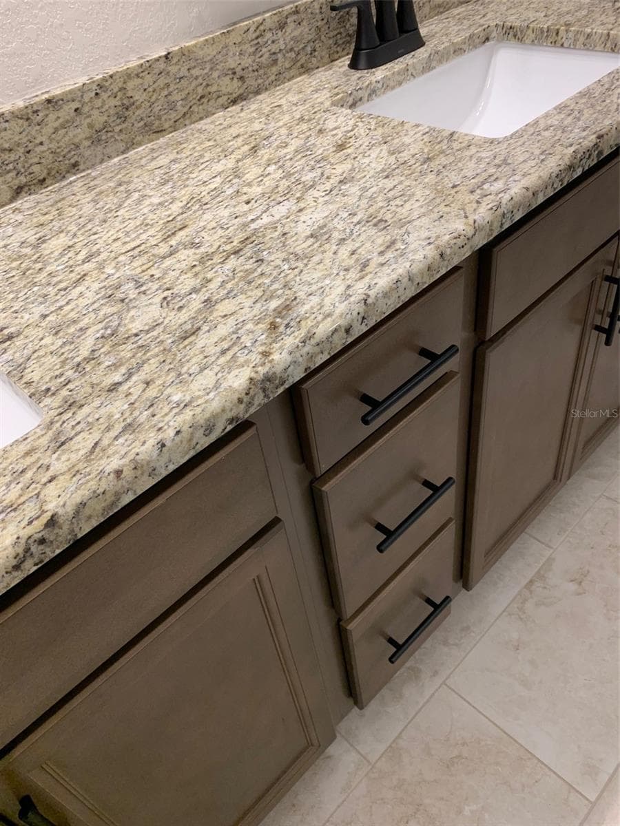 cabinets/counters/tile flooring - 11611 GRACE RD, WEEKI WACHEE