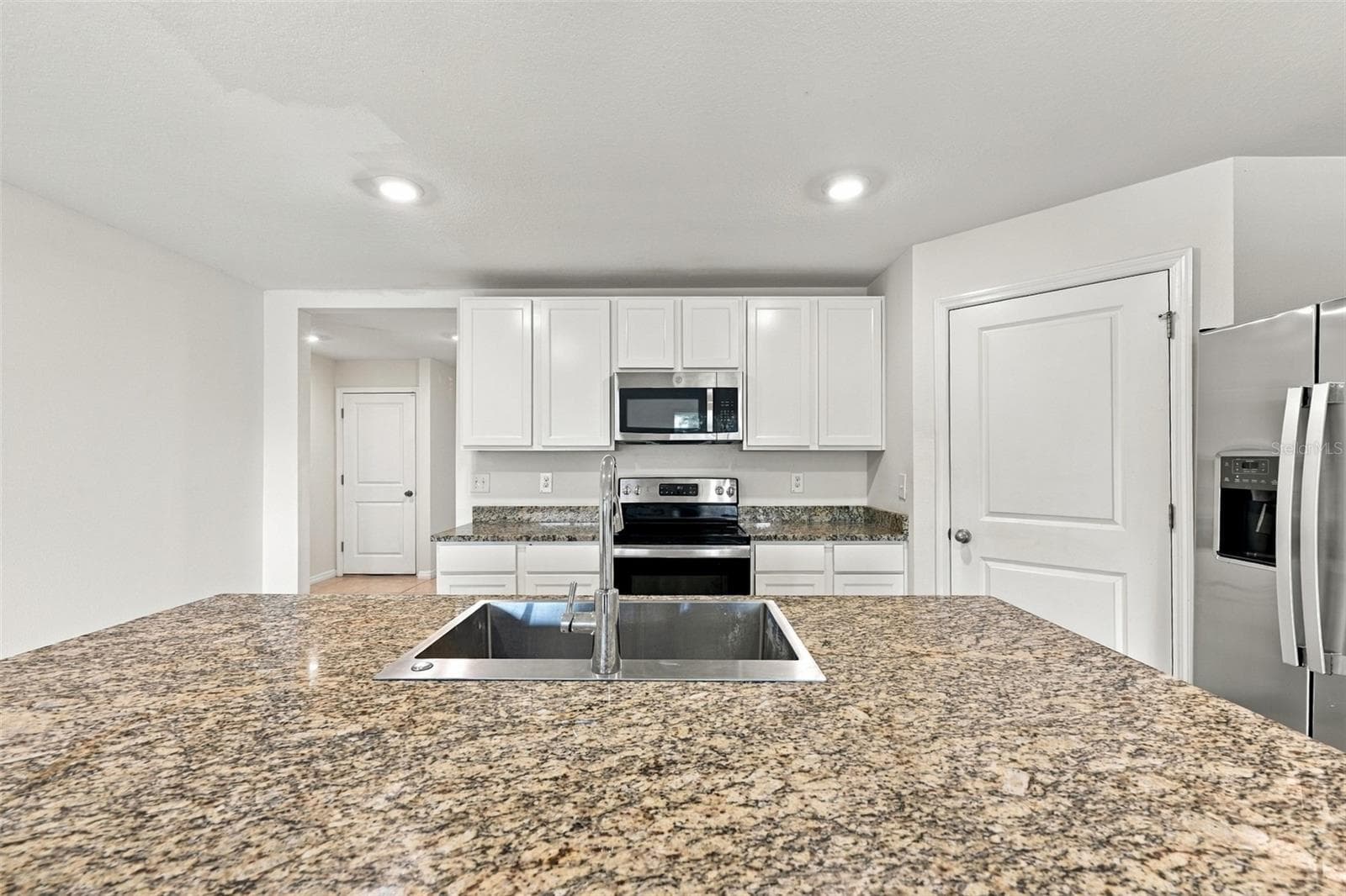 Single Family Residence at 7980 BROAD POINTE DR, ZEPHYRHILLS, photo 11 of 46