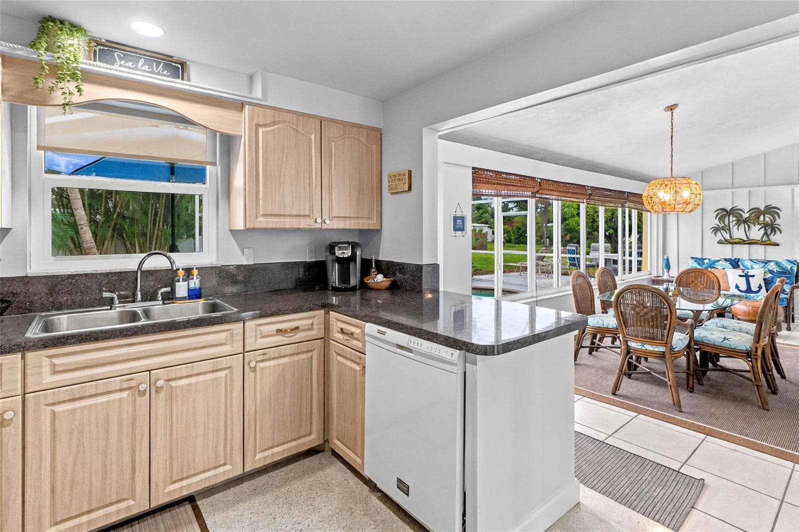 Kitchen adjoining the Florida room dining area. - 912 CHURCH ST, VENICE