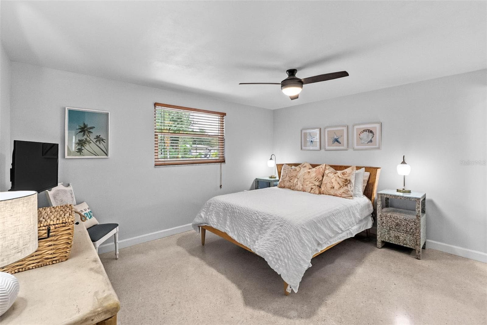 Primary bedroom with coordinating coastal furnishings. - 912 CHURCH ST, VENICE