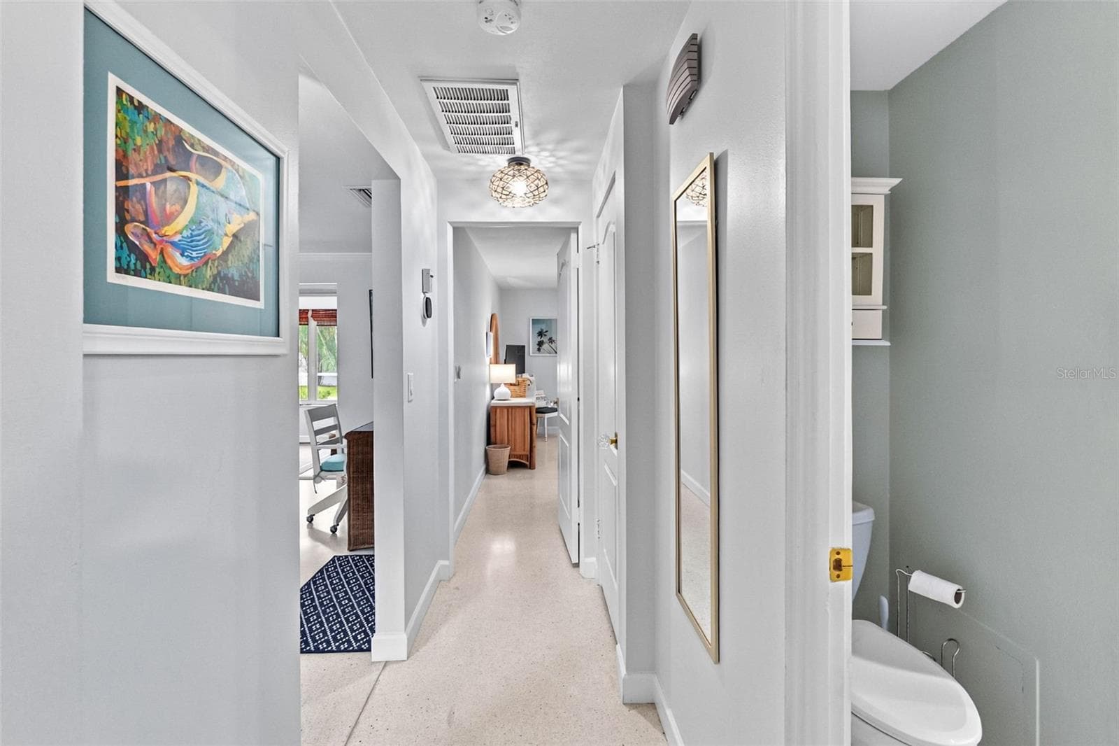 Hallway connecting the bedrooms and guest bathroom. - 912 CHURCH ST, VENICE