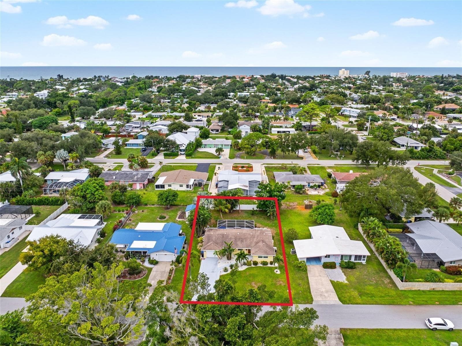 Aerial view of the home and surrounding neighborhood with close proximity to Gulf. - 912 CHURCH ST, VENICE