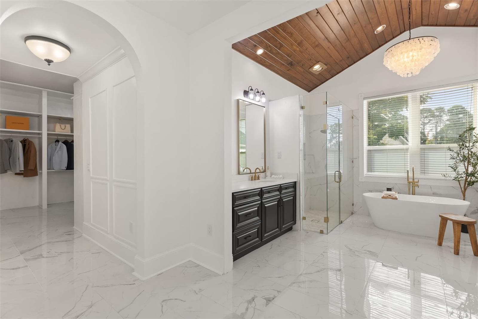 Primary Bathroom looking into Closet - 7703 SADLER RD, MOUNT DORA