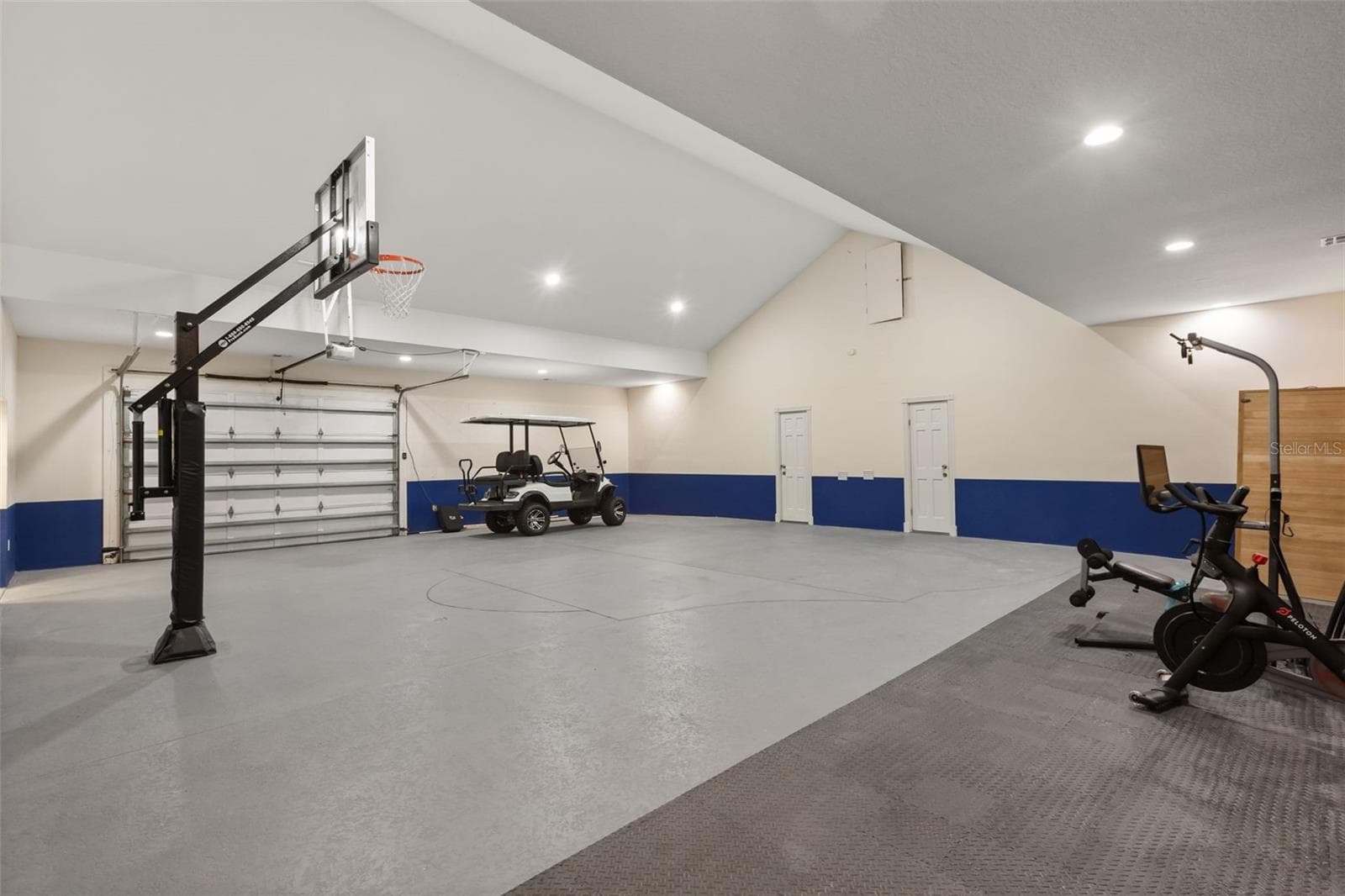 Garage Gym showing entrances to two In-Law Suites - 7703 SADLER RD, MOUNT DORA
