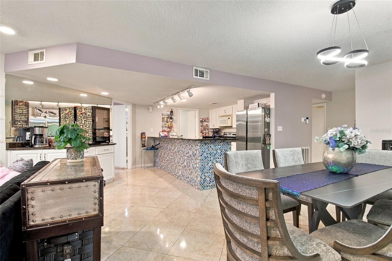 Dining Room into Open Concept LR, Kitchen - 2511 DOLLY BAY DR #104, PALM HARBOR