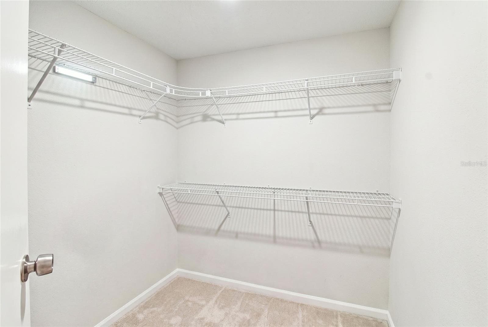 Closet with items removed by AI to show size - 2511 DOLLY BAY DR #104, PALM HARBOR
