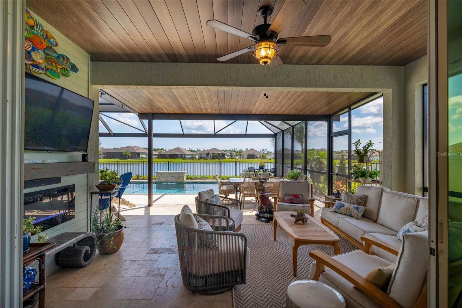 Entertainment center with built-in electric fireplace, lighting, and added electrical outlets. - 627 OCEAN JASPER DR, ST AUGUSTINE