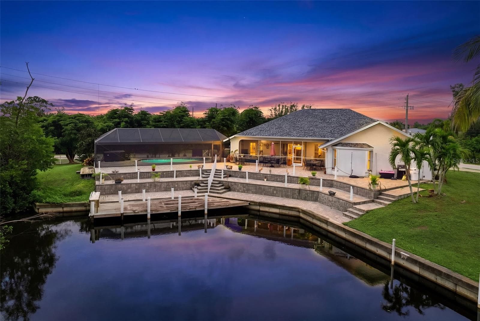 Dock and Canal at Twilight - 614 RIO VILLA DR, PUNTA GORDA