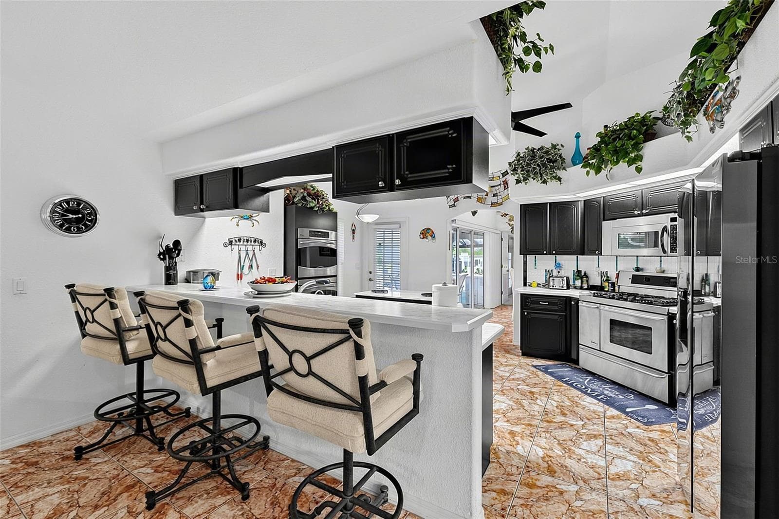 Kitchen with Breakfast Bar - 614 RIO VILLA DR, PUNTA GORDA
