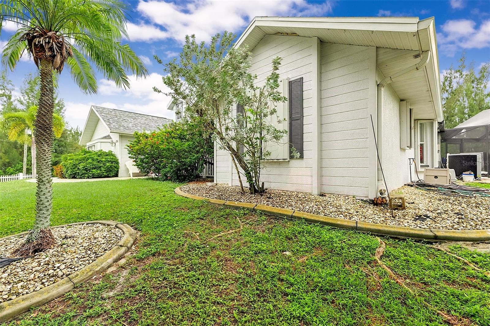 Side Exterior - 614 RIO VILLA DR, PUNTA GORDA